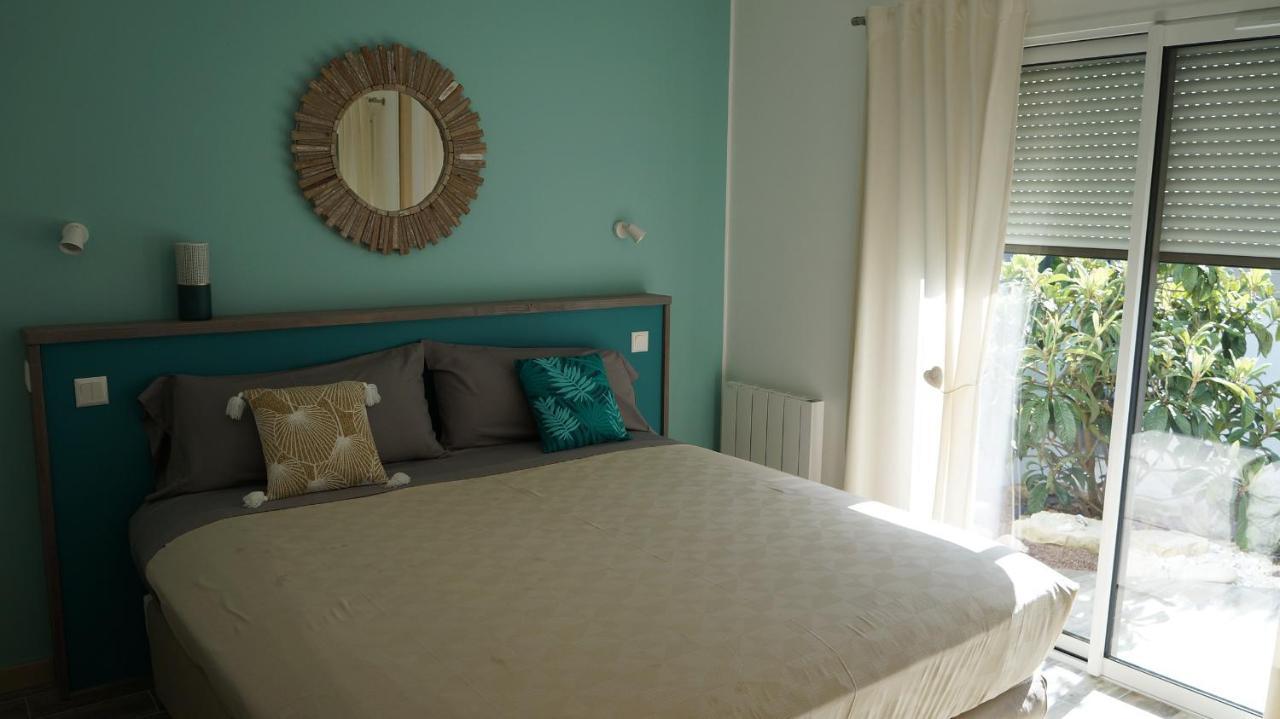 Les palmiers - Vacation Home Saint-Xandre Extérieur photo